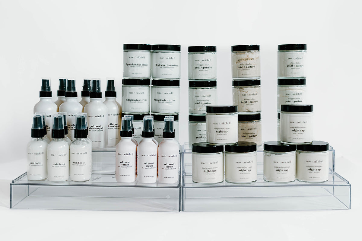 the founding shelf, the full mac + mitchell lineup on clear acrylic risers