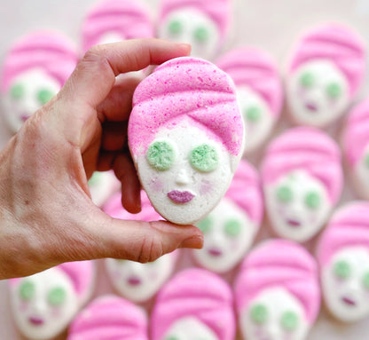 mac + mitchell hand painted spa bath bomb shaped like spa girl with head wrap