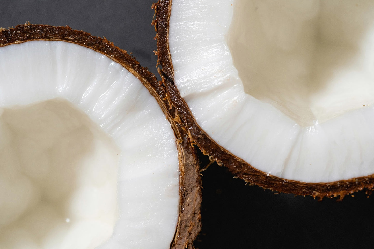 fresh coconut halves representing mac + mitchell lux milk bath key ingredient