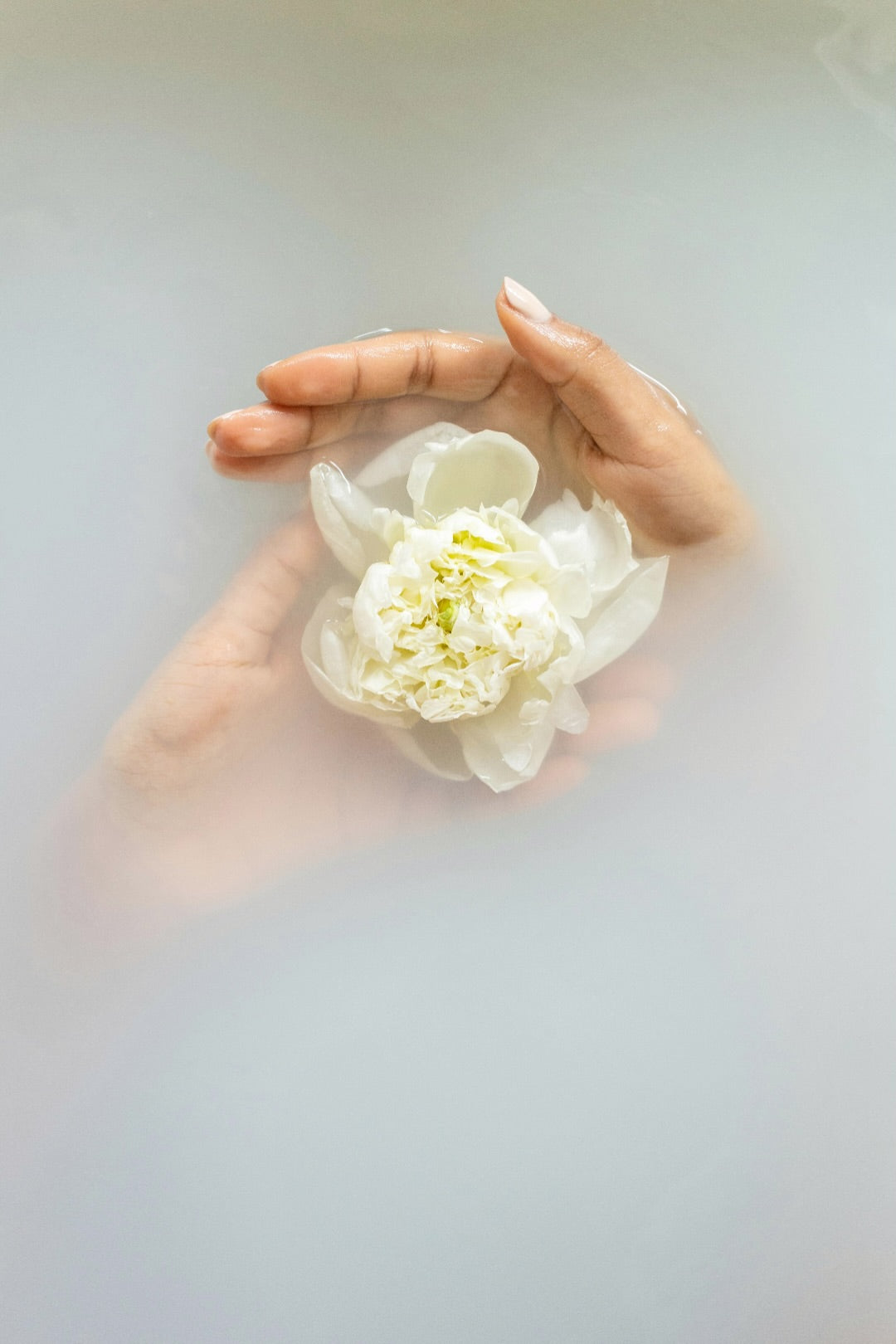 mac + mitchell lux milk bath styled with fresh flowers