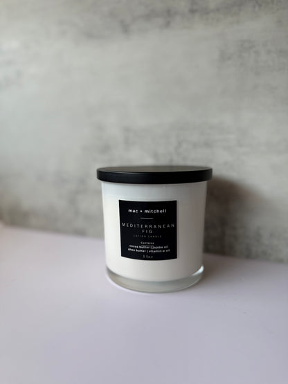 mac + mitchell luxurious lotion candle in white glass container with wooden wick