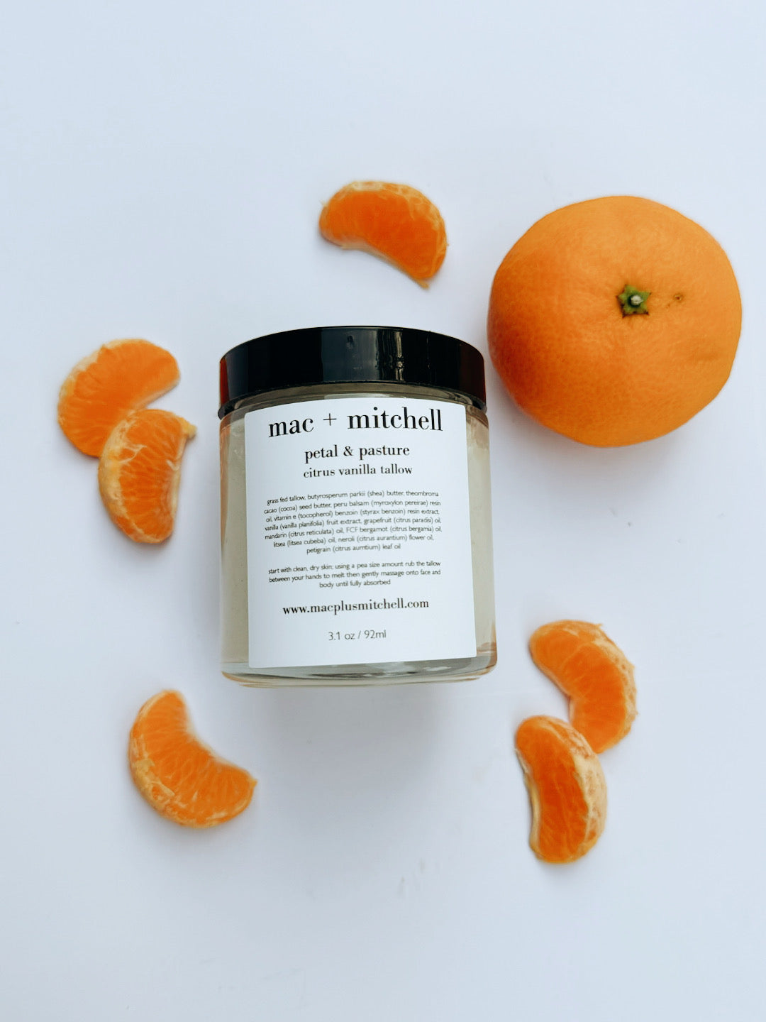 mac + mitchell petal + pasture citrus vanilla whipped tallow jar with fresh oranges