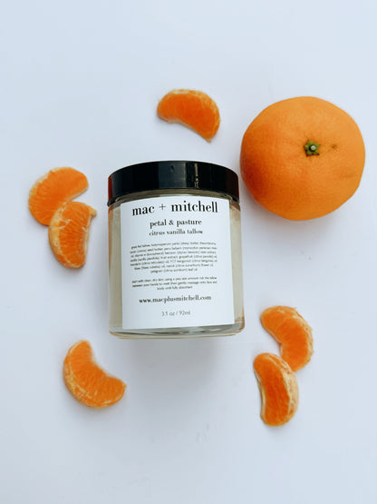 mac + mitchell petal + pasture citrus vanilla whipped tallow jar with fresh oranges